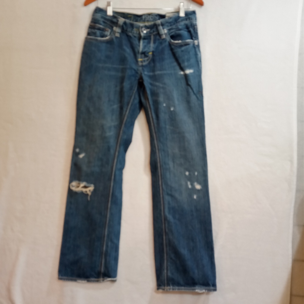 1969 men's distressed jeans in medium wash size 29/30